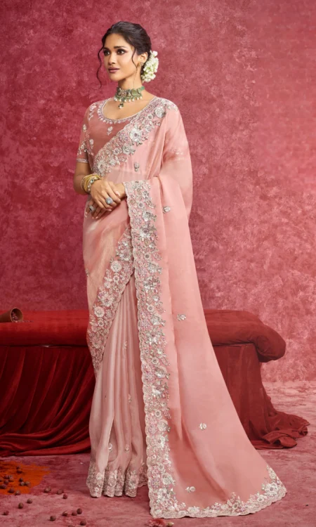 Peach or pink? We let you decide saree